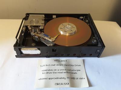 Top view of the hard disk drive with an original note